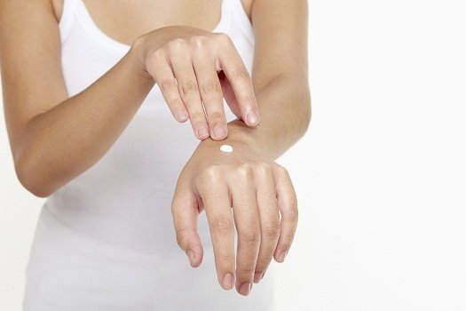 You could add a few drops of pure grapefruit oil to your hand cream.