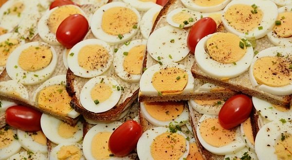 Fortified cereals and breads, eggs, leafy greens, nuts, and oily fish can boost vitamin D levels.